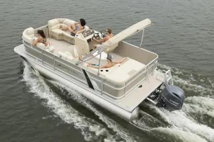 Slide: The Image of Manufacturer Provided Image: 2020 Starcraft EX 20 C pontoon boat cruising on water with passengers. - 30
