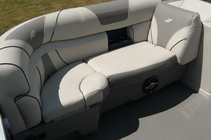 Slide: The Image of 2020 Starcraft EX 20 C boat interior with plush seating and cup holders. - 4