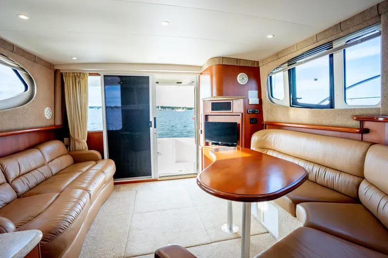 Slide: The Image of Luxurious interior of 2005 Silverton 34 Convertible yacht with leather seating and ocean view. - 27