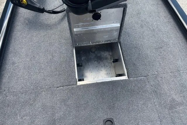 Slide: The Image of 2025 Tracker Pro 170 boat interior with open storage compartment. - 10