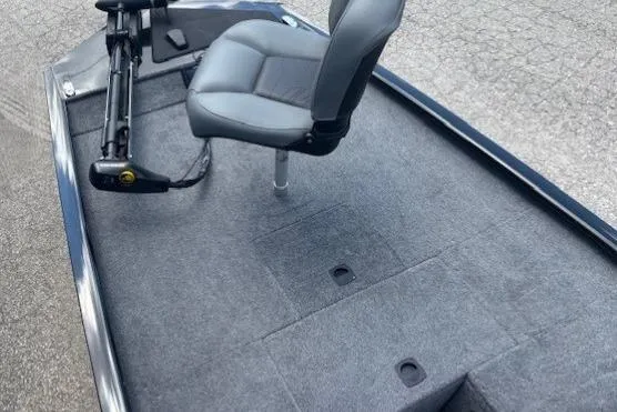 Slide: The Image of 2025 Tracker Pro 170 boat interior with gray seating and carpeted deck. - 7