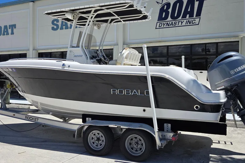The Image of 2017 Robalo R222 Center Console boat on trailer at dealership. - 0