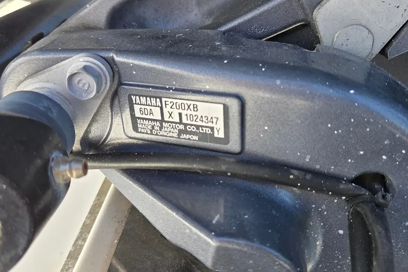 Slide: The Image of Yamaha F200XB engine detail on 2017 Robalo R222 Center Console boat. - 14