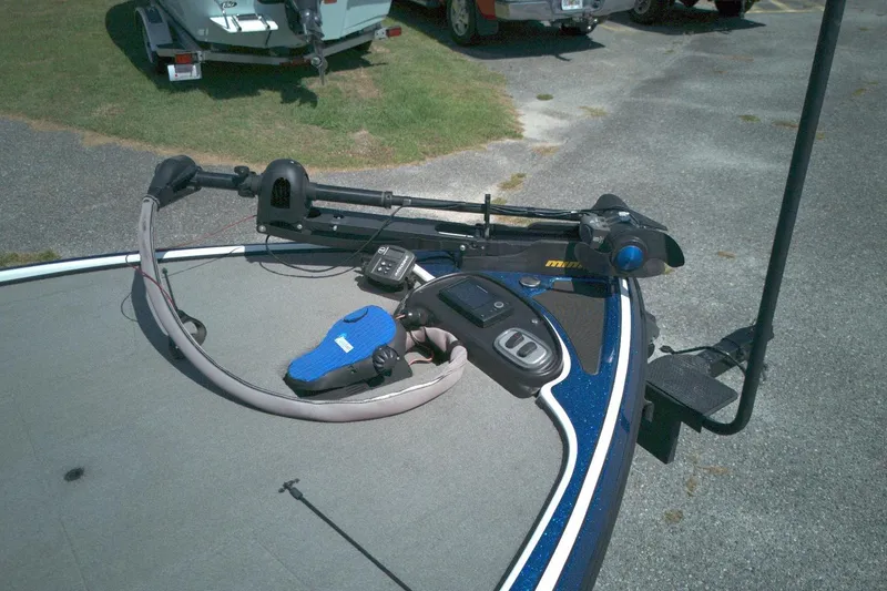 Slide: The Image of 2015 Nitro Z-7SC boat with trolling motor and fishing equipment on deck. - 3