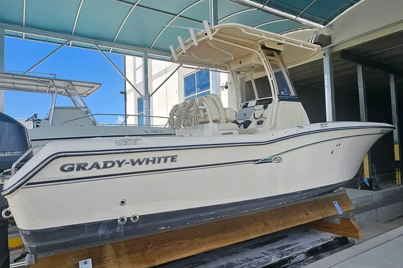 Slide: The Image of 2017 Grady-White Fisherman 257 boat under a canopy, side view. - 11