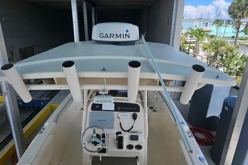 Slide: The Image of 2017 Grady-White Fisherman 257 boat with Garmin equipment, docked in a marina. - 16