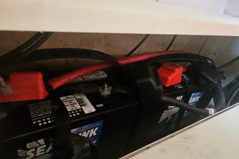 Slide: The Image of Marine battery setup in a 2017 Grady-White Fisherman 257 boat. - 23