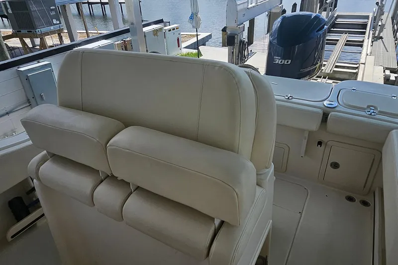 Slide: The Image of 2017 Grady-White Fisherman 257 boat interior with seating and Yamaha 300 engine. - 29