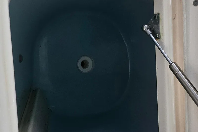 Slide: The Image of 2017 Grady-White Fisherman 257 boat compartment interior with hydraulic support. - 31