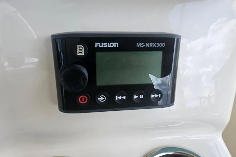 Slide: The Image of Fusion MS-NRX300 marine stereo on 2017 Grady-White Fisherman 257 boat dashboard. - 38