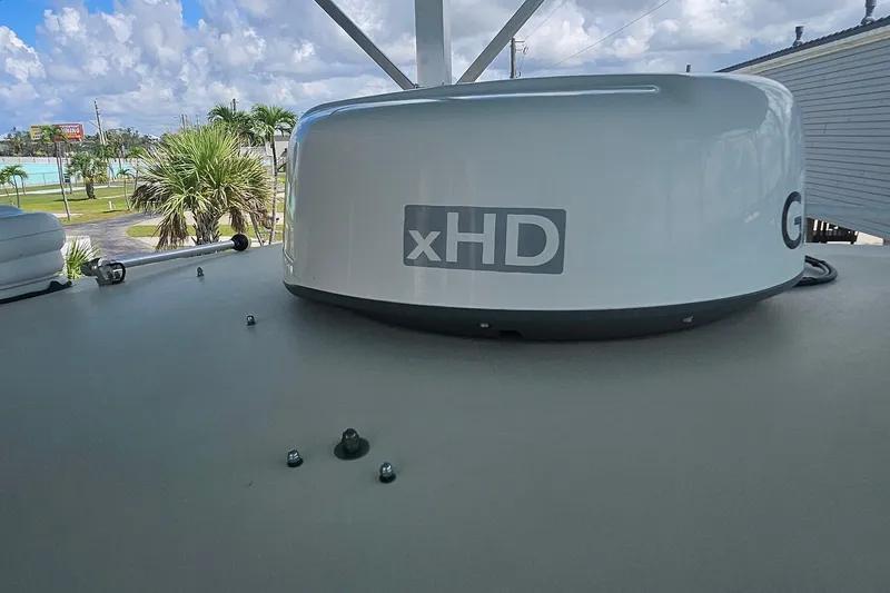 Slide: The Image of 2017 Grady-White Fisherman 257 boat with xHD radar, outdoor setting. - 44