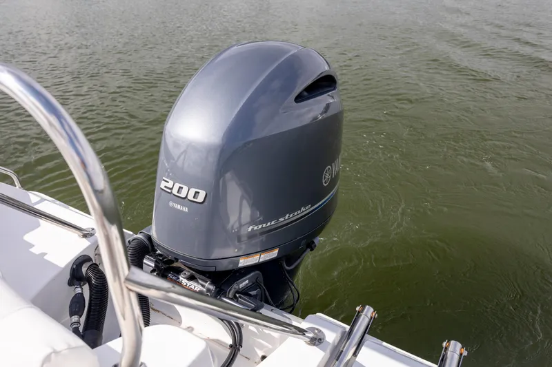 Slide: The Image of Yamaha 200 horsepower outboard motor on 2016 Sea Hunt Ultra 225 boat. - 22