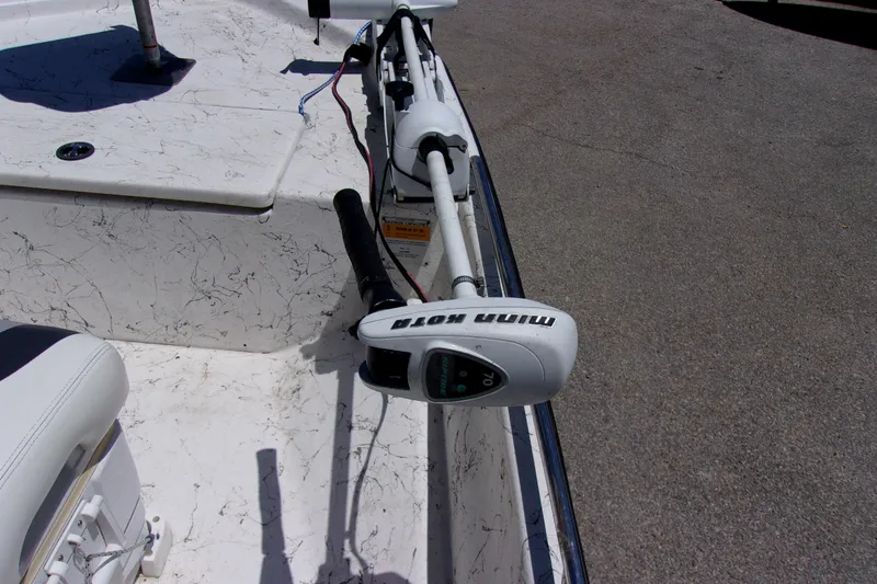 Slide: The Image of 2011 Blue Wave 180 Super Tunnel boat with Minn Kota trolling motor on deck. - 12