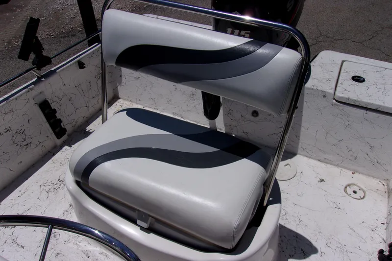 Slide: The Image of 2011 Blue Wave 180 Super Tunnel boat seat with stylish black and gray design. - 5