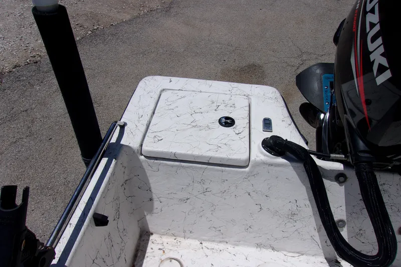 Slide: The Image of 2011 Blue Wave 180 Super Tunnel boat with Suzuki outboard motor, rear deck view. - 7