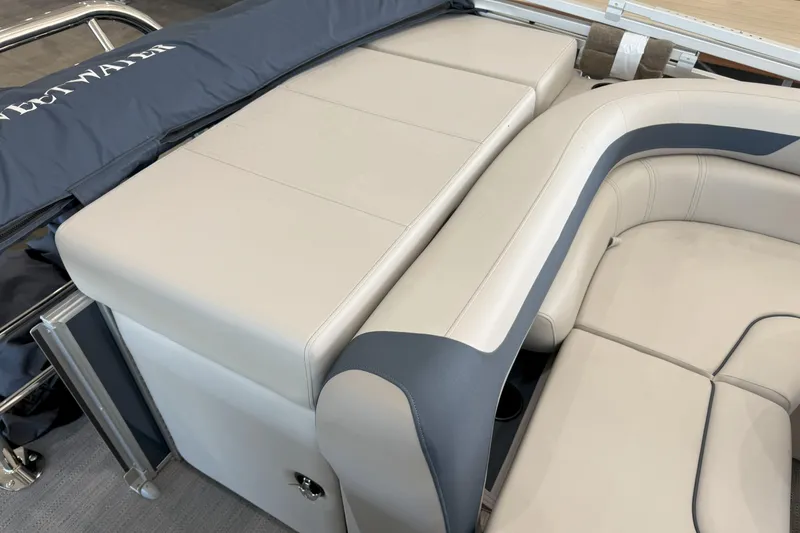 Slide: The Image of 2026 Godfrey Sweetwater 2086 C boat interior with beige and gray seating. - 12
