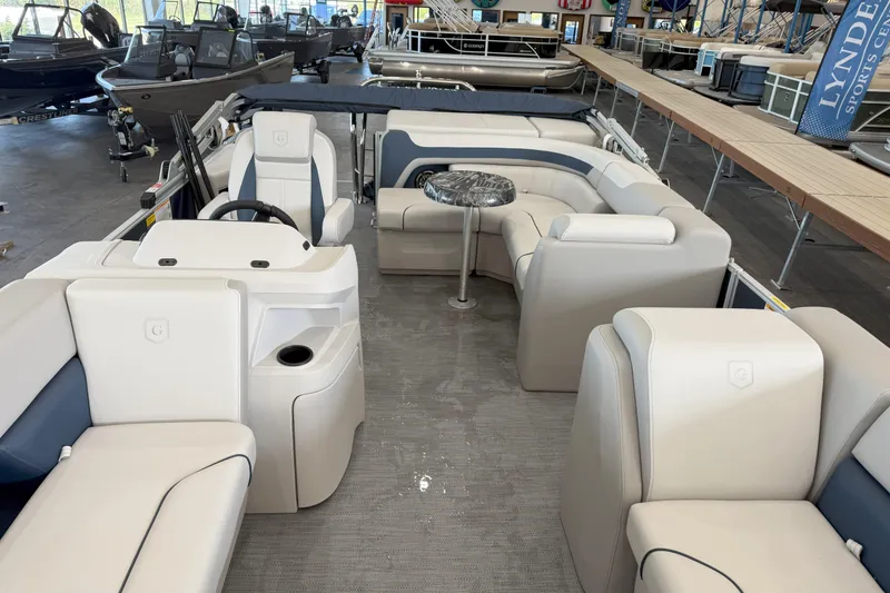 Slide: The Image of Interior of 2026 Godfrey Sweetwater 2086 C pontoon boat with luxurious seating and table. - 6