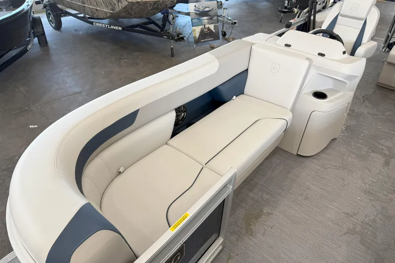 Slide: The Image of 2026 Godfrey Sweetwater 2086 C pontoon boat interior with white and blue seating. - 7