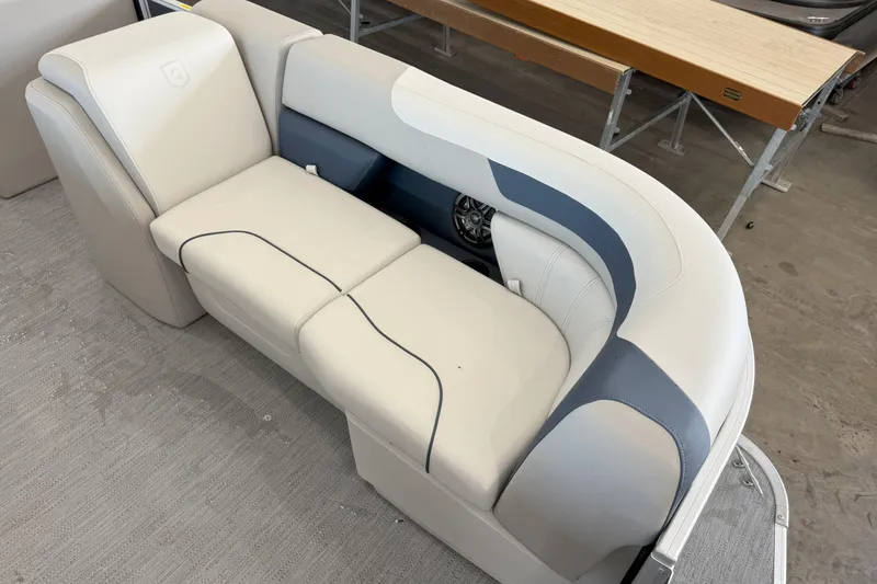 Slide: The Image of 2026 Godfrey Sweetwater 2086 C boat seating, featuring modern white and blue upholstery. - 8