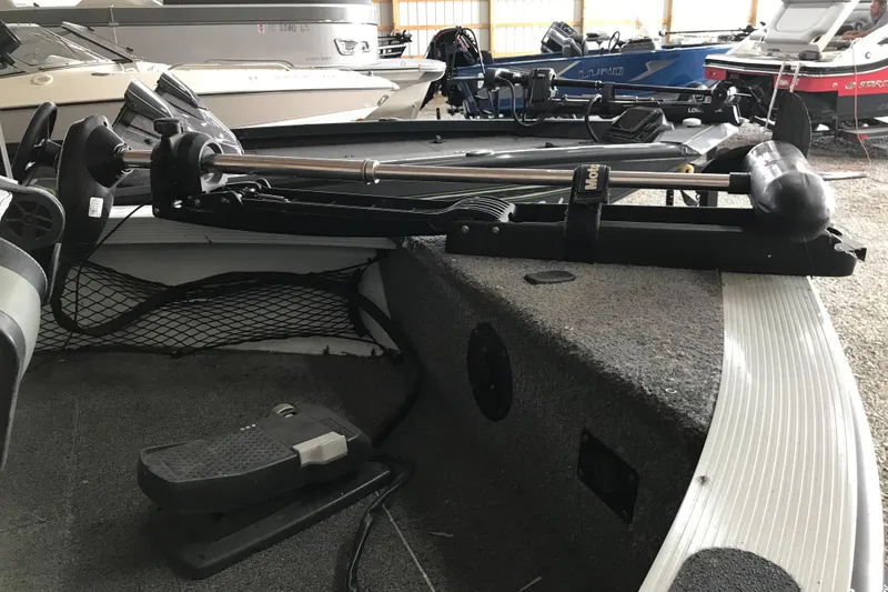 Slide: The Image of 2009 Triton DV 17 Liberty boat interior with trolling motor and foot pedal. - 7