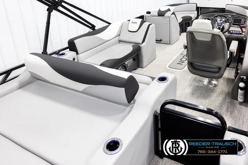 Slide: The Image of Luxurious interior of 2026 Avalon LSZ VRB pontoon boat with plush seating and modern dashboard. - 12