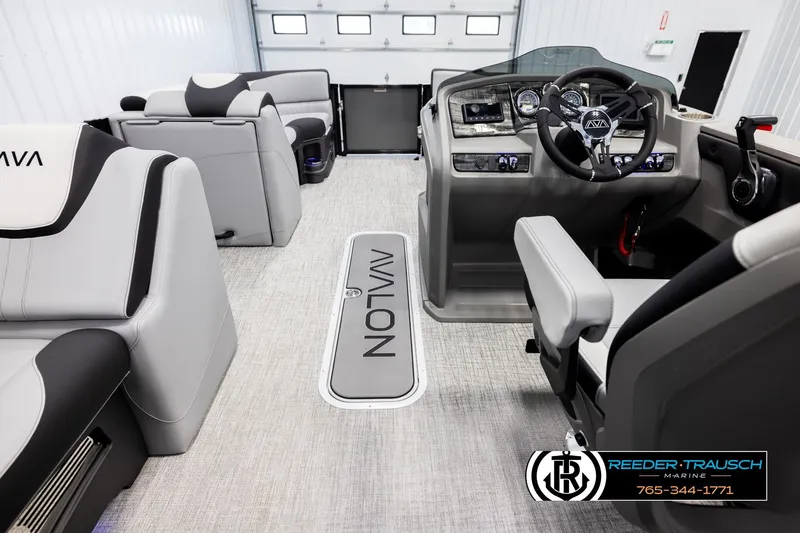 Slide: The Image of Interior of 2026 Avalon LSZ VRB boat with modern seating and control panel. - 17