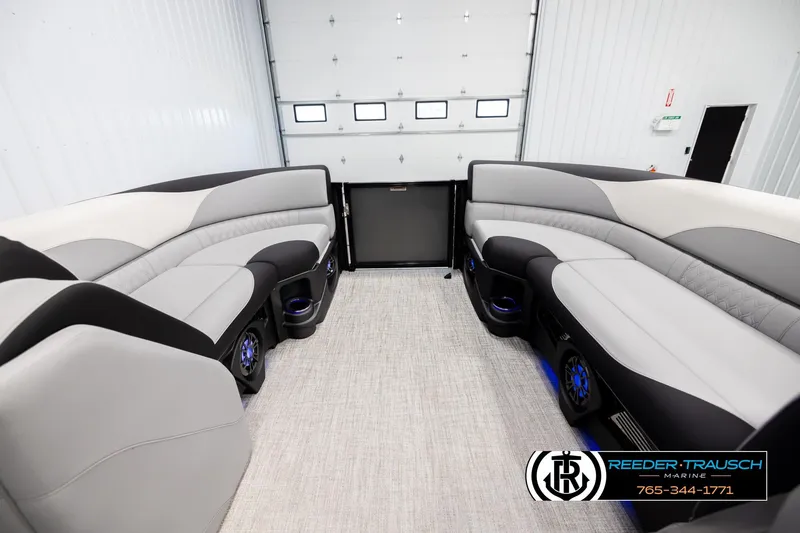 Slide: The Image of Luxurious interior of 2026 Avalon LSZ VRB pontoon boat with plush seating and modern design. - 18