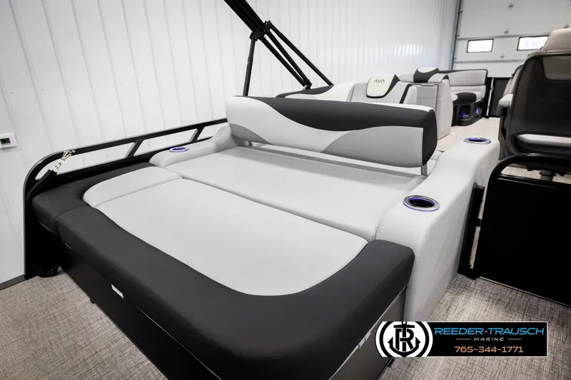Slide: The Image of 2026 Avalon LSZ VRB boat interior with sleek seating and cup holders. - 25
