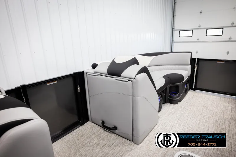 Slide: The Image of Luxurious interior of 2026 Avalon LSZ VRB pontoon boat with plush seating. - 29