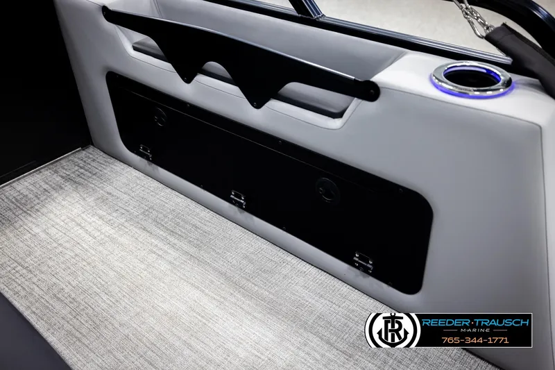 Slide: The Image of Interior of 2026 Avalon LSZ VRB boat with sleek design and modern cup holder. - 31