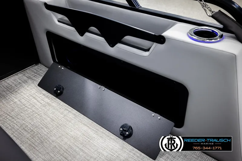 Slide: The Image of 2026 Avalon LSZ VRB interior with storage compartment and cup holder, featuring modern design elements. - 32