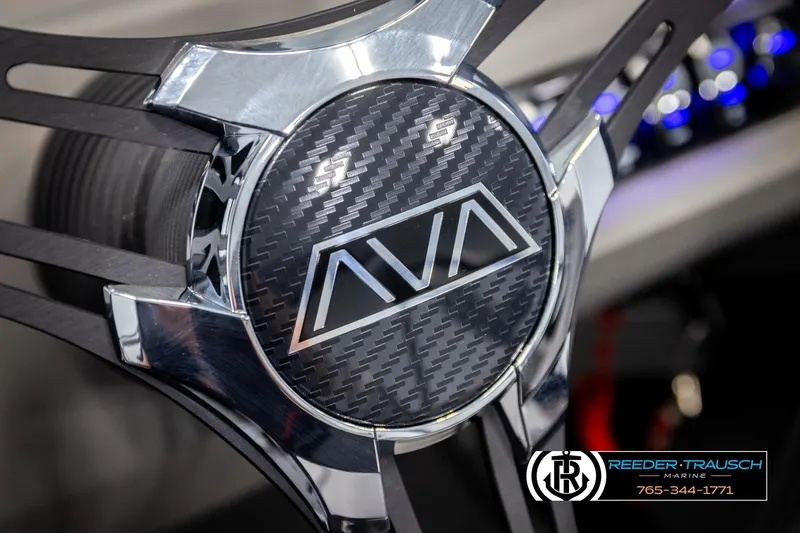 Slide: The Image of Close-up of 2026 Avalon LSZ VRB steering wheel with carbon fiber design. - 35