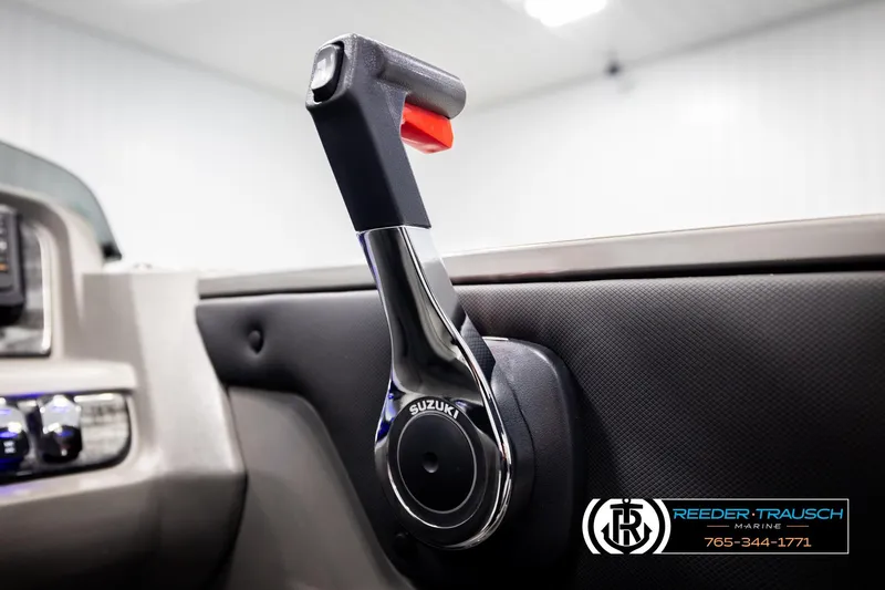 Slide: The Image of 2026 Avalon LSZ VRB boat throttle control with Suzuki branding in a modern interior. - 41
