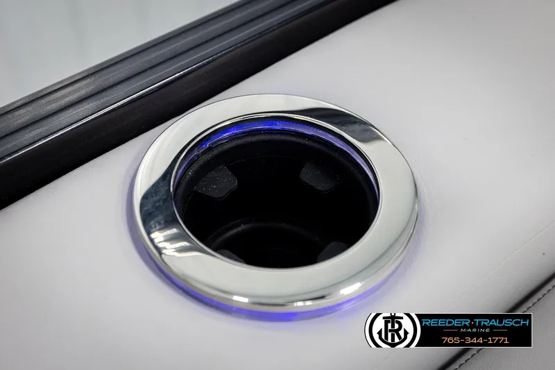 Slide: The Image of 2026 Avalon LSZ VRB boat cup holder with blue LED lighting. - 46