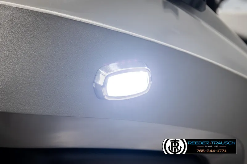 Slide: The Image of Close-up of 2026 Avalon LSZ VRB boat light, illuminated against a sleek surface. - 47