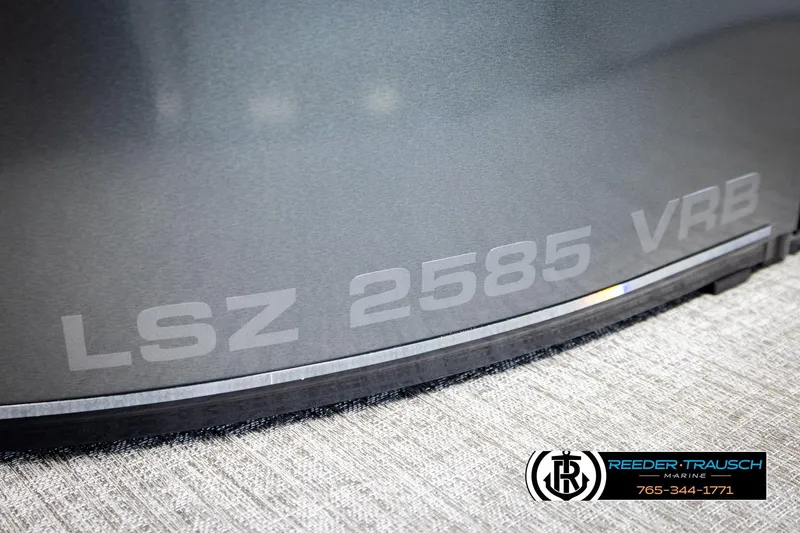 Slide: The Image of 2026 Avalon LSZ VRB boat detail with Reeder-Trausch Marine branding. - 50