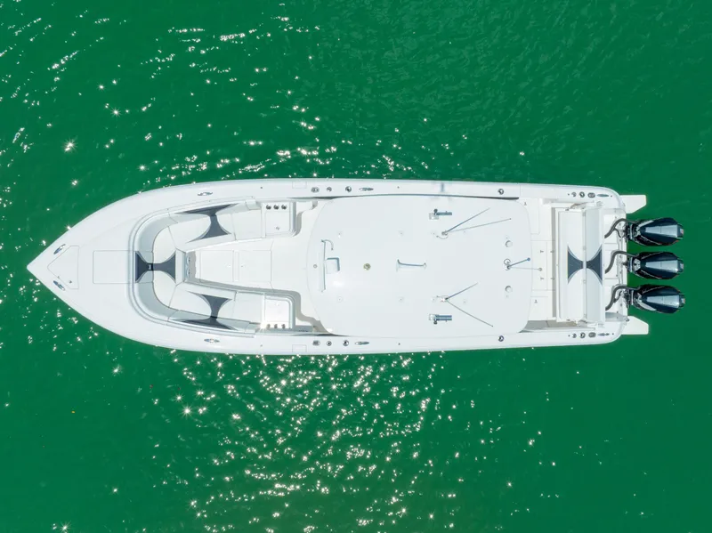 Slide: The Image of Aerial view of 2018 Intrepid 375 Open boat on green water. - 14