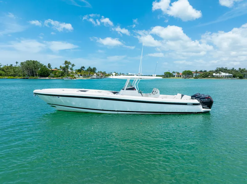 Slide: The Image of 2018 Intrepid 375 Open boat on clear blue water under a sunny sky. - 9