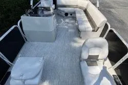 Slide: The Image of 2020 SunCatcher V20 Fish & Cruise pontoon boat interior with seating and helm. - 2
