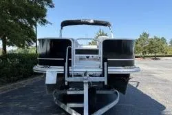 Slide: The Image of 2020 SunCatcher V20 Fish & Cruise pontoon boat on trailer, parked outdoors. - 4