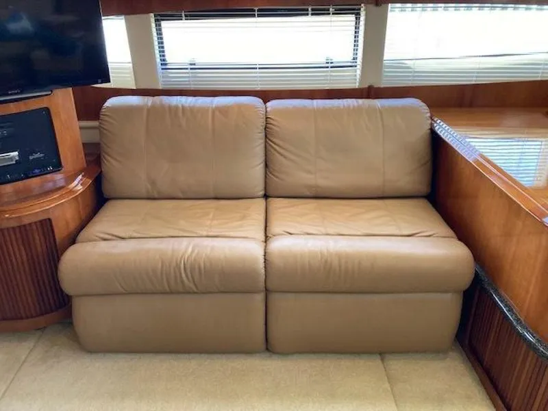 Slide: The Image of Beige leather sofa in 2003 Carver 396 Aft Cabin MY interior. - 13