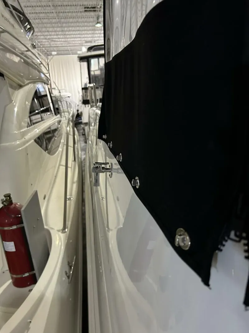 Slide: The Image of 2003 Carver 396 Aft Cabin MY yacht side view in marina storage. - 20