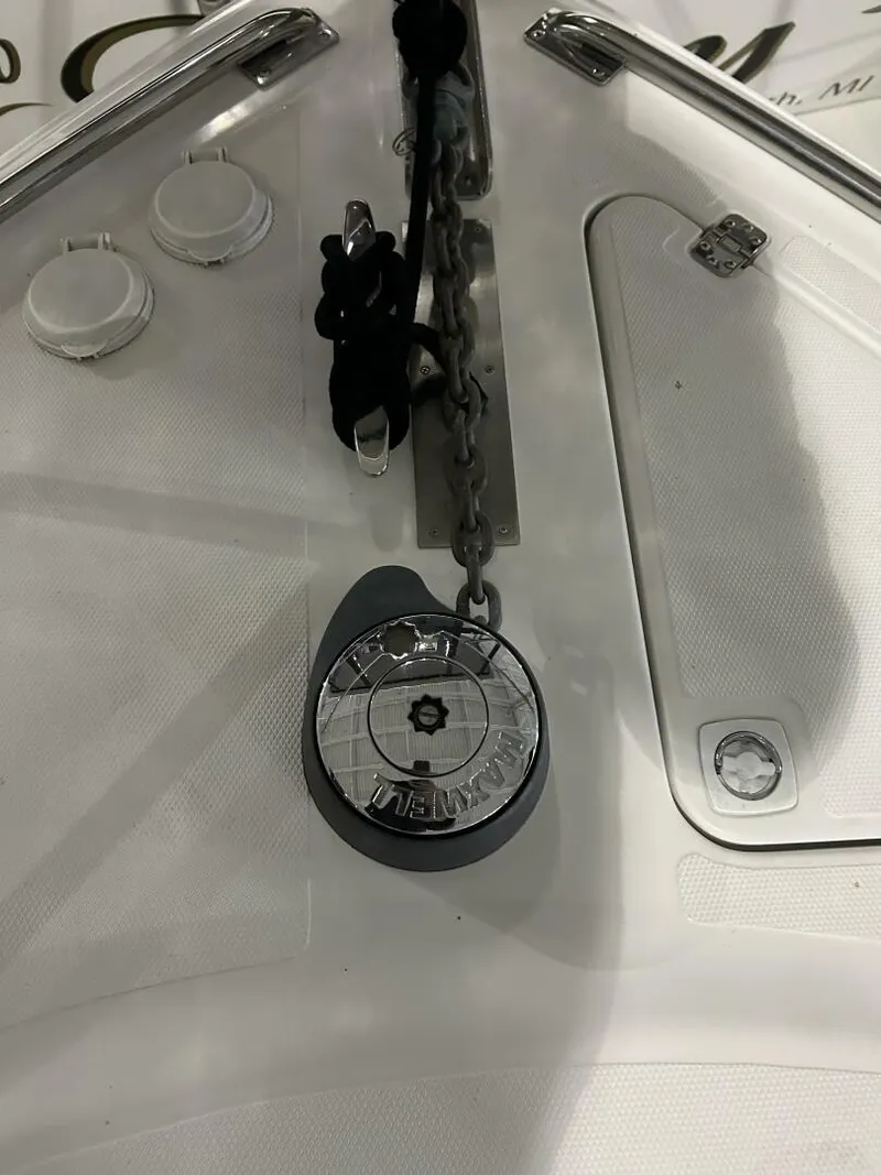 Slide: The Image of 2003 Carver 396 Aft Cabin MY boat deck with anchor chain and winch. - 36