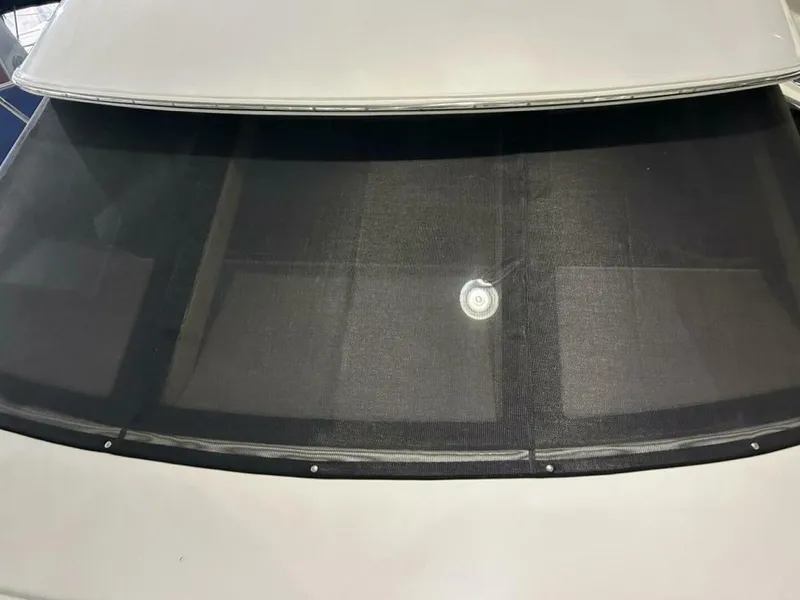 Slide: The Image of 2003 Carver 396 Aft Cabin MY with black mesh windshield cover. - 41