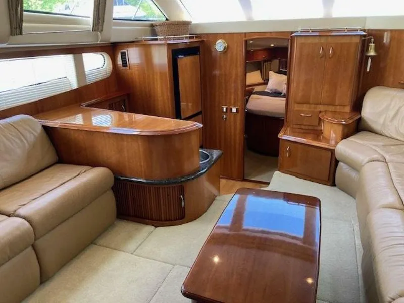 Slide: The Image of Luxurious interior of 2003 Carver 396 Aft Cabin MY yacht with wood finishes. - 11