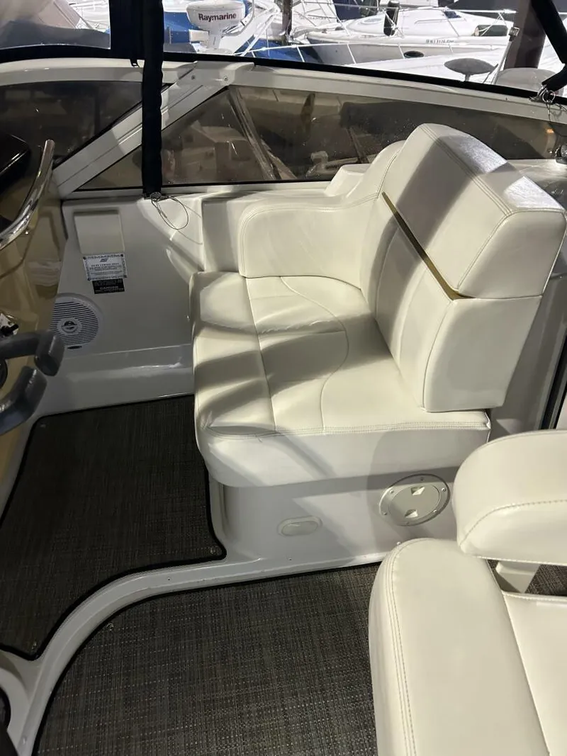 Slide: The Image of 2003 Carver 396 Aft Cabin MY interior with white leather seating. - 26