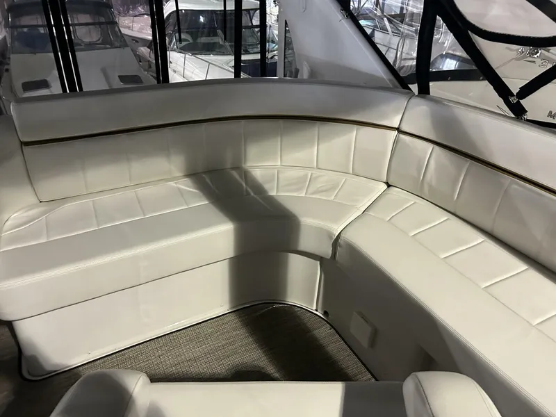 Slide: The Image of 2003 Carver 396 Aft Cabin MY interior with white leather seating. - 29