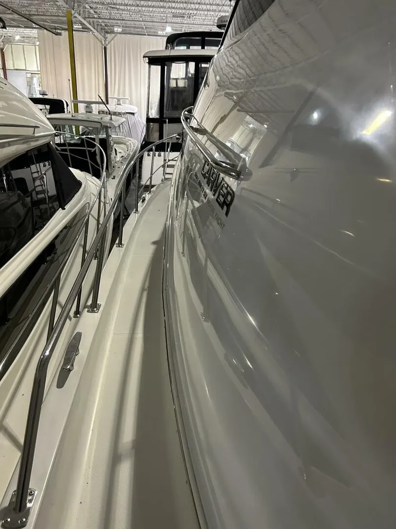 Slide: The Image of 2003 Carver 396 Aft Cabin MY yacht in storage, side view. - 34