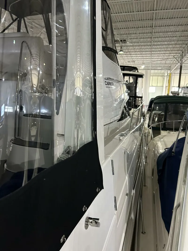 Slide: The Image of 2003 Carver 396 Aft Cabin MY yacht in storage, side view. - 40