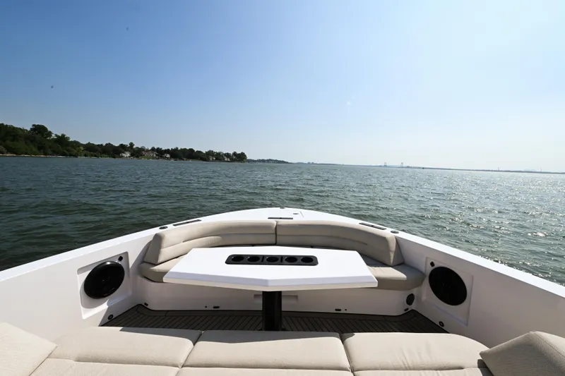 Slide: The Image of Luxury Vanquish VQ58 yacht interior, 2022 model, with scenic ocean view. - 12